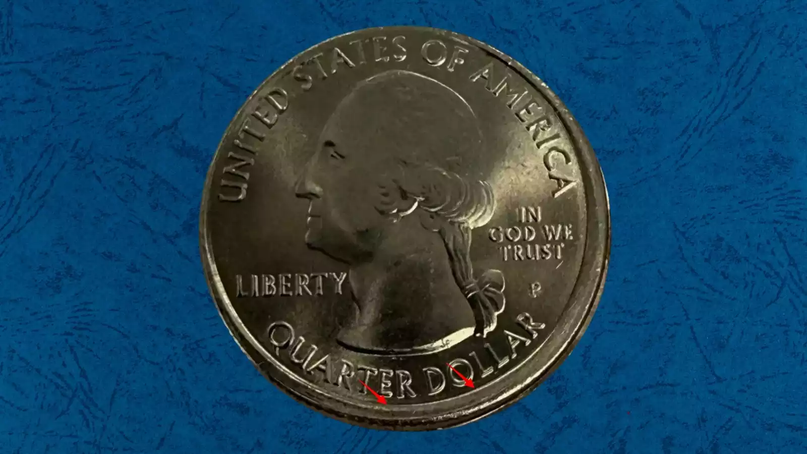 2020 quarter off-center strike error showing the design shifted to one side with a blank crescent of unstruck planchet visible